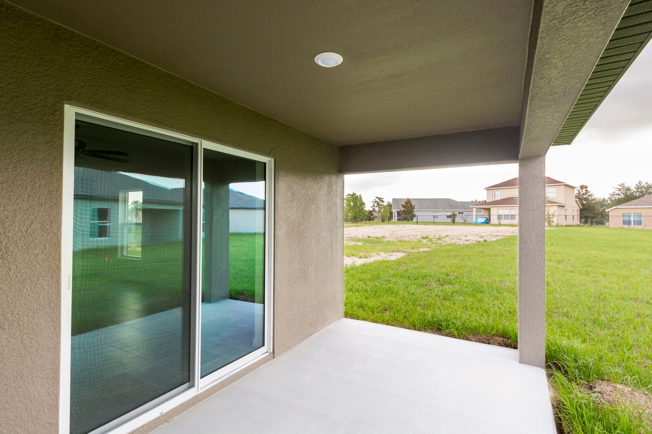 Take the gatherings outdoors on the covered back patio