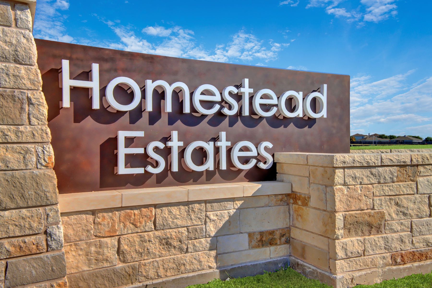 The gorgeous entry monument at Homestead Estates.