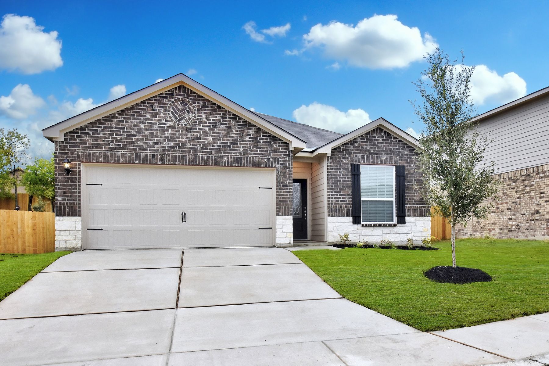 The Fannin plan is a charming single-story home.