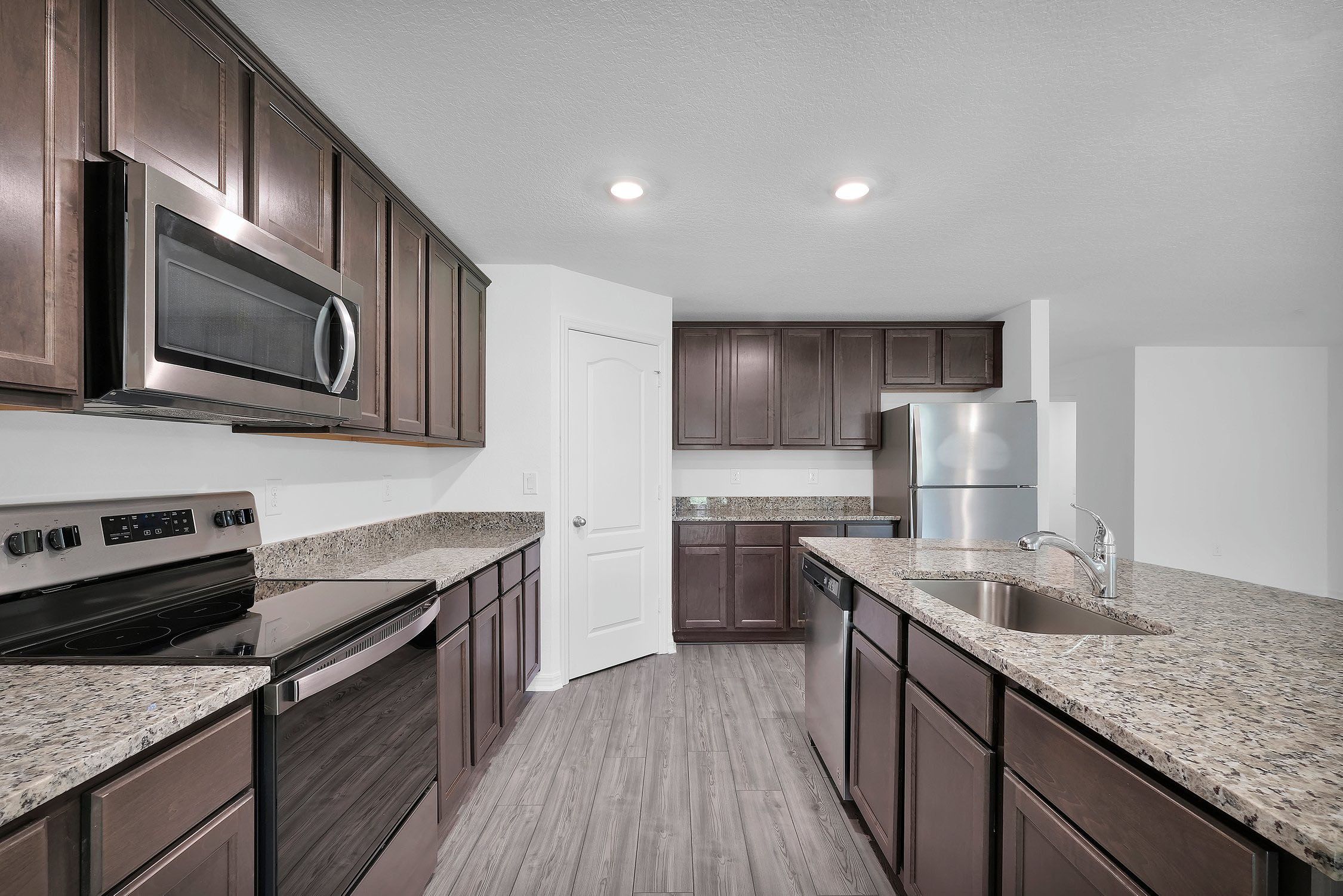This move-in ready home features gorgeous granite countertops in the kitchen