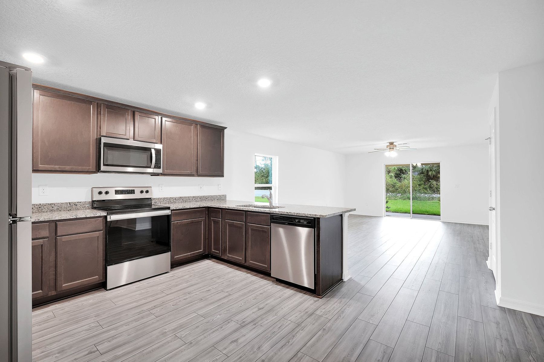 This move-in ready home features gorgeous granite countertops in the kitchen