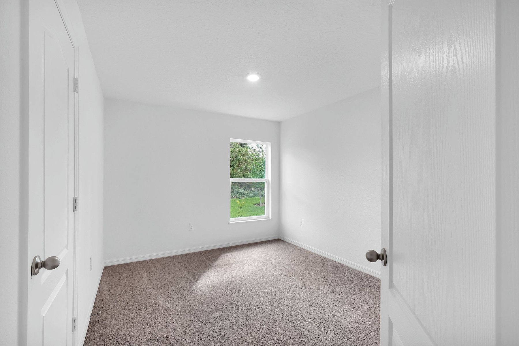 Spacious bedrooms and closets abound in this new home