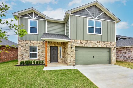 The beautiful Sahoma Plan is a two-story, gem of a home!