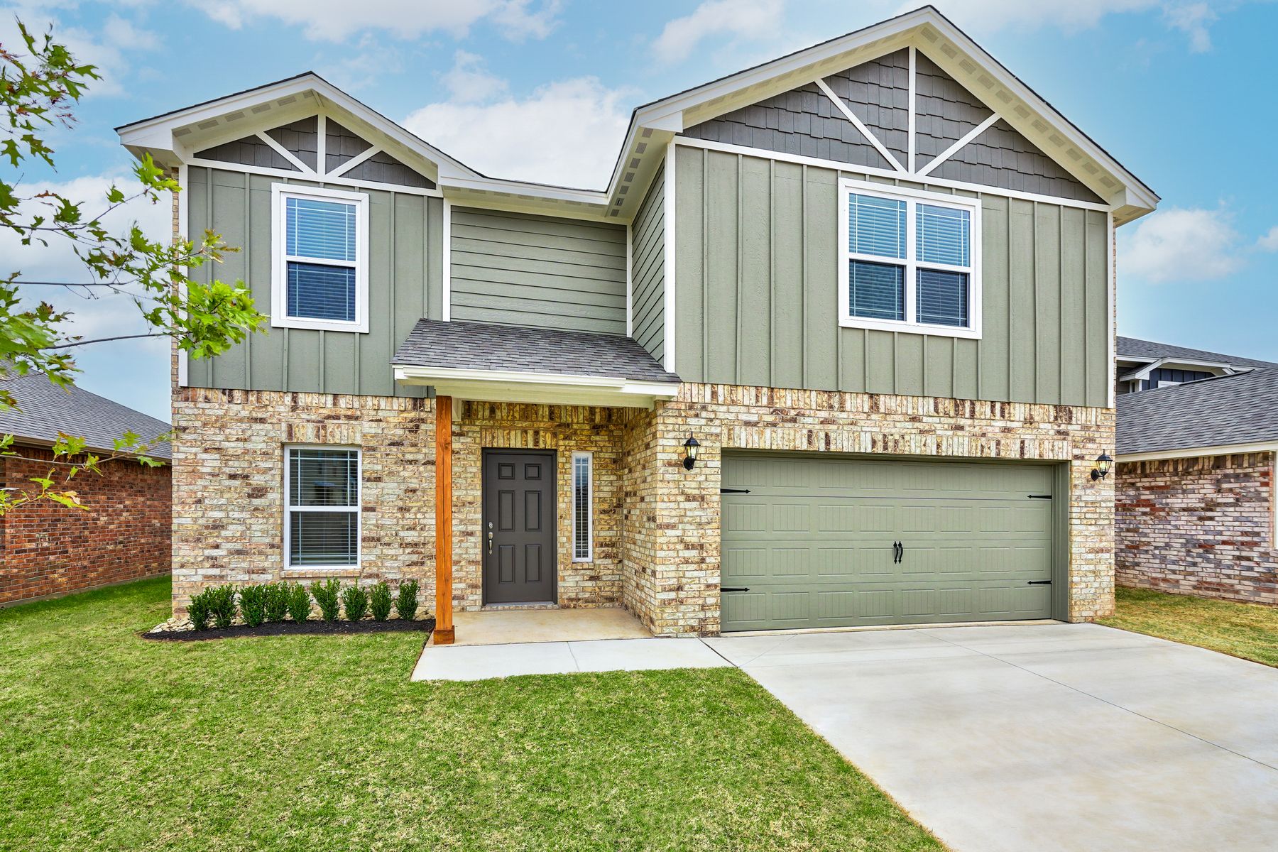 The beautiful Sahoma Plan is a two-story, gem of a home!