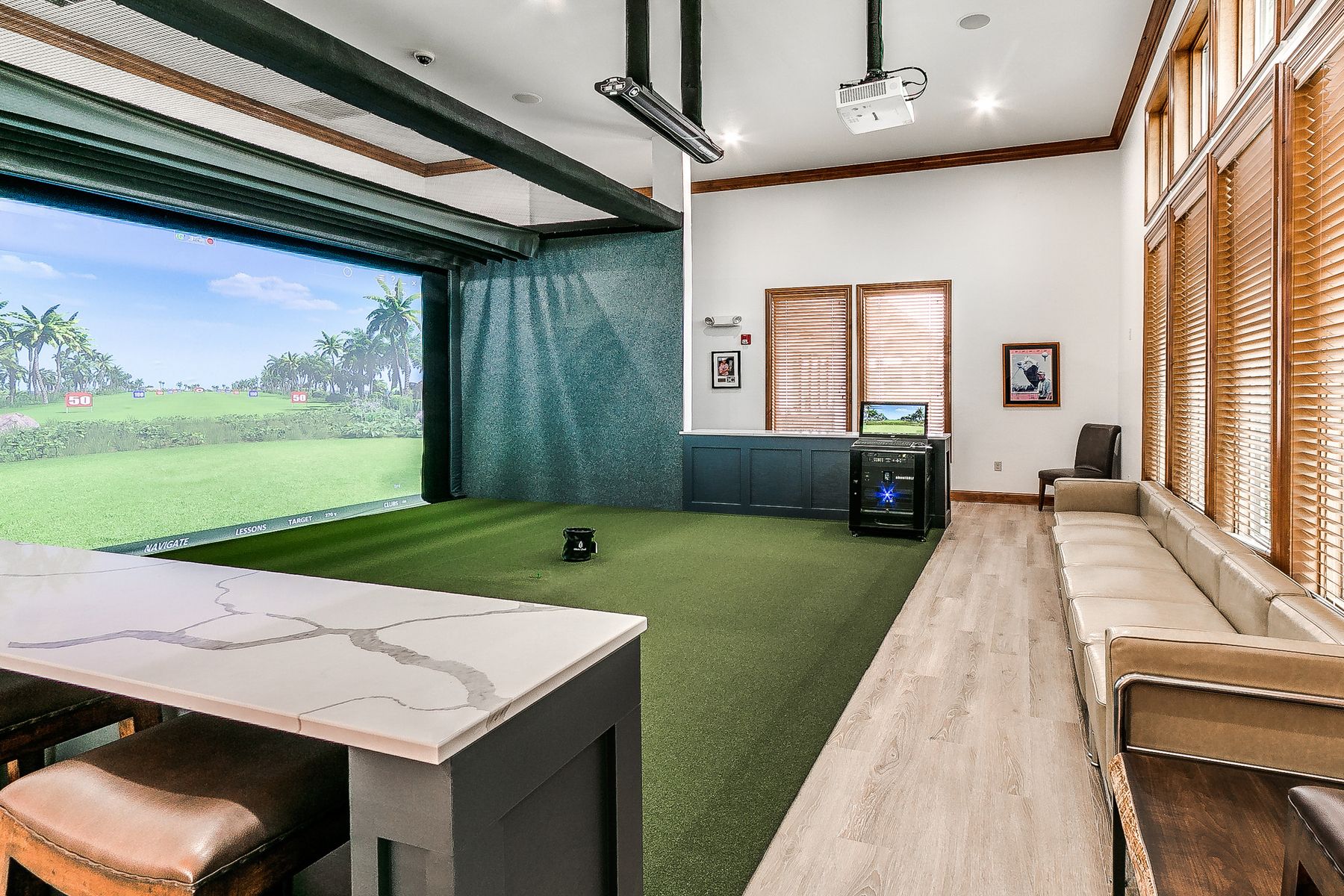 Perfect your golf swing at the onsite golf simulator.