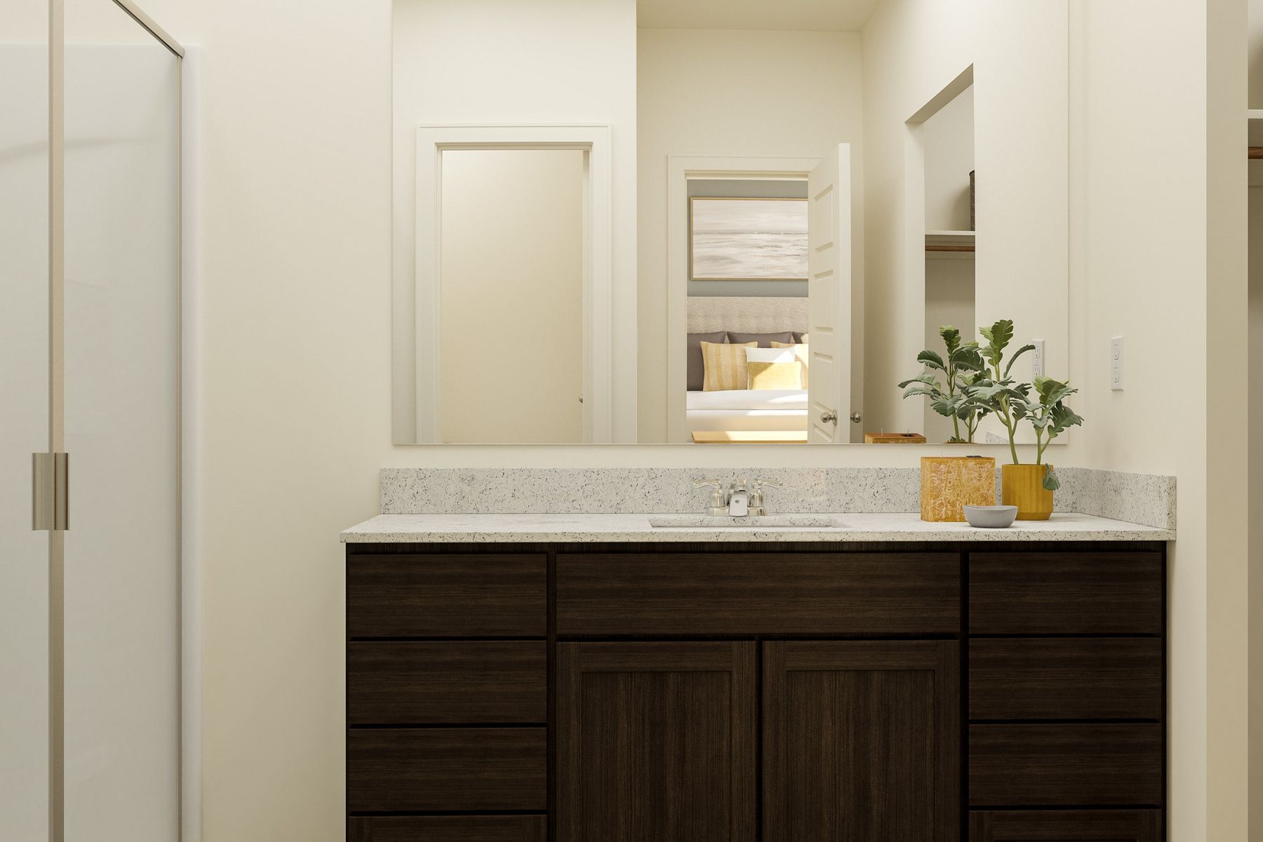 The master bathroom has a large vanity and a step in shower.