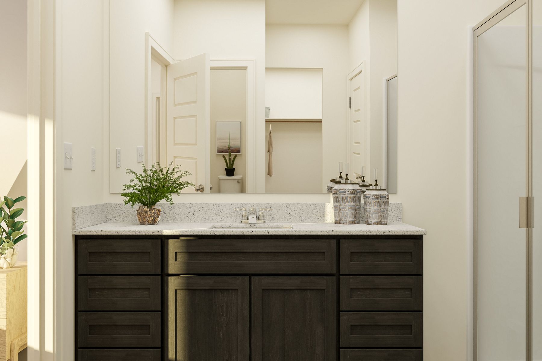Inside the en-suite master bathroom, you'll find a step in shower and a large vanity!
