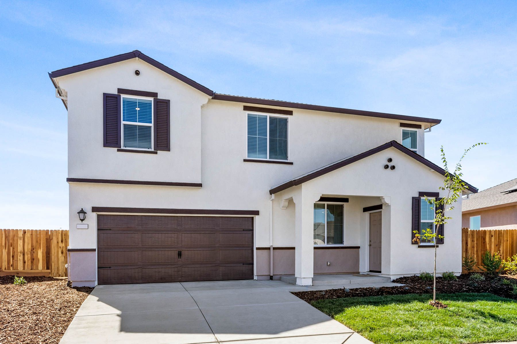 The Malibu is a two-story home with stucco.