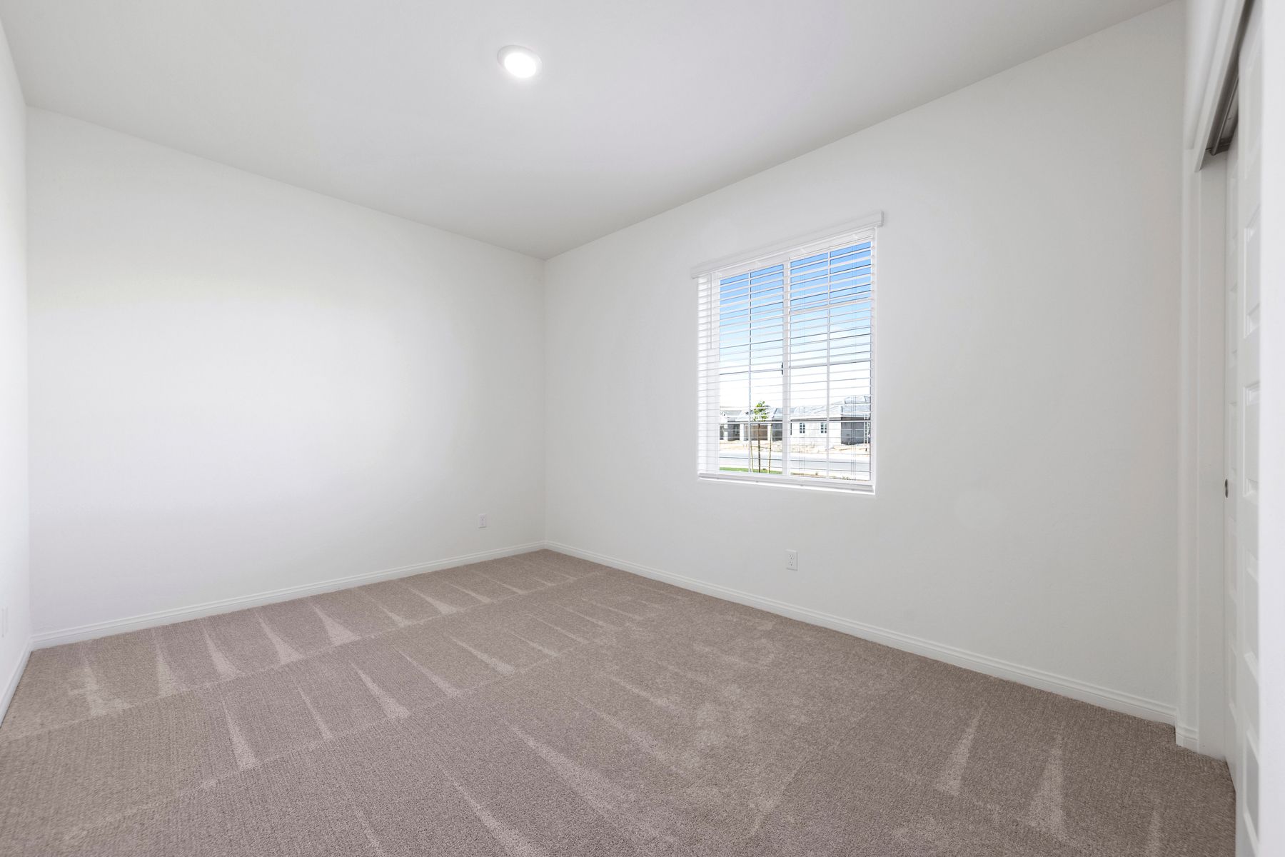 All the secondary bedrooms come with carpet. 