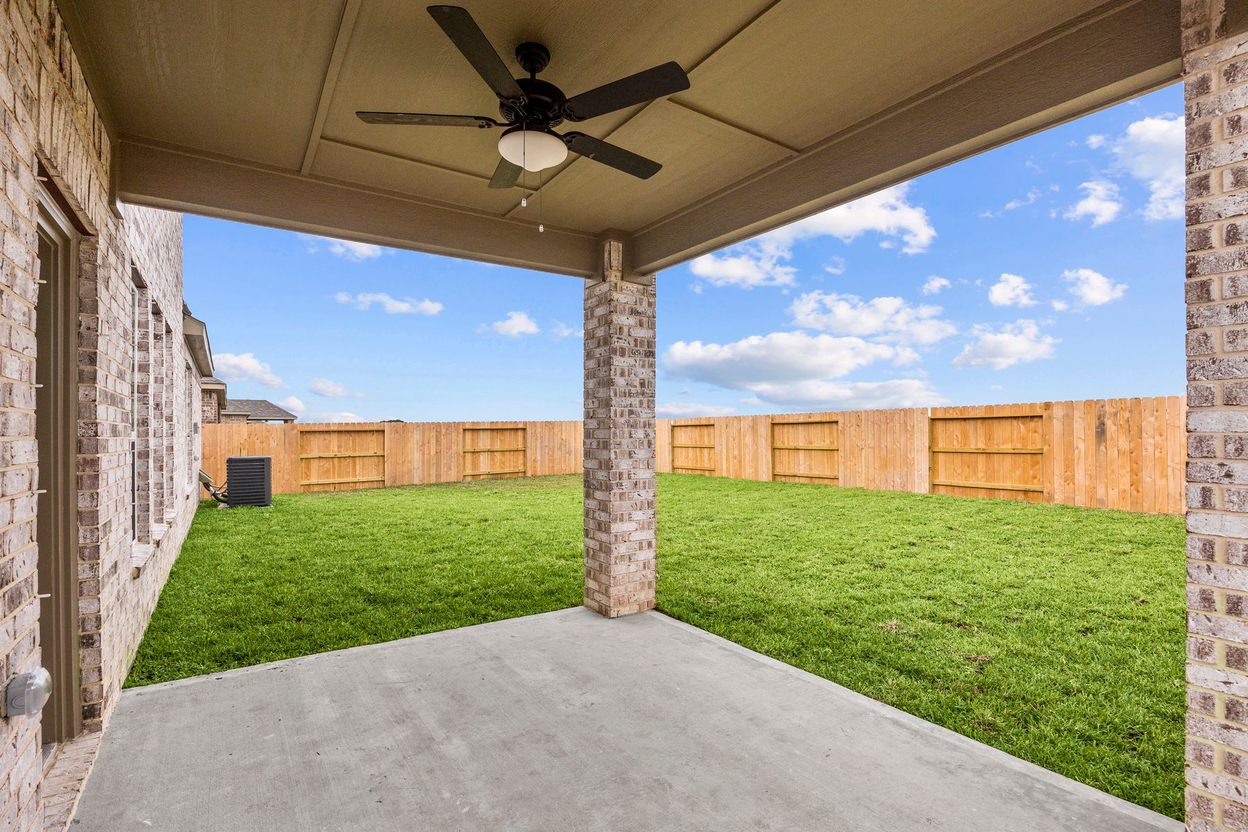The Redwood plan has a large covered back patio.
