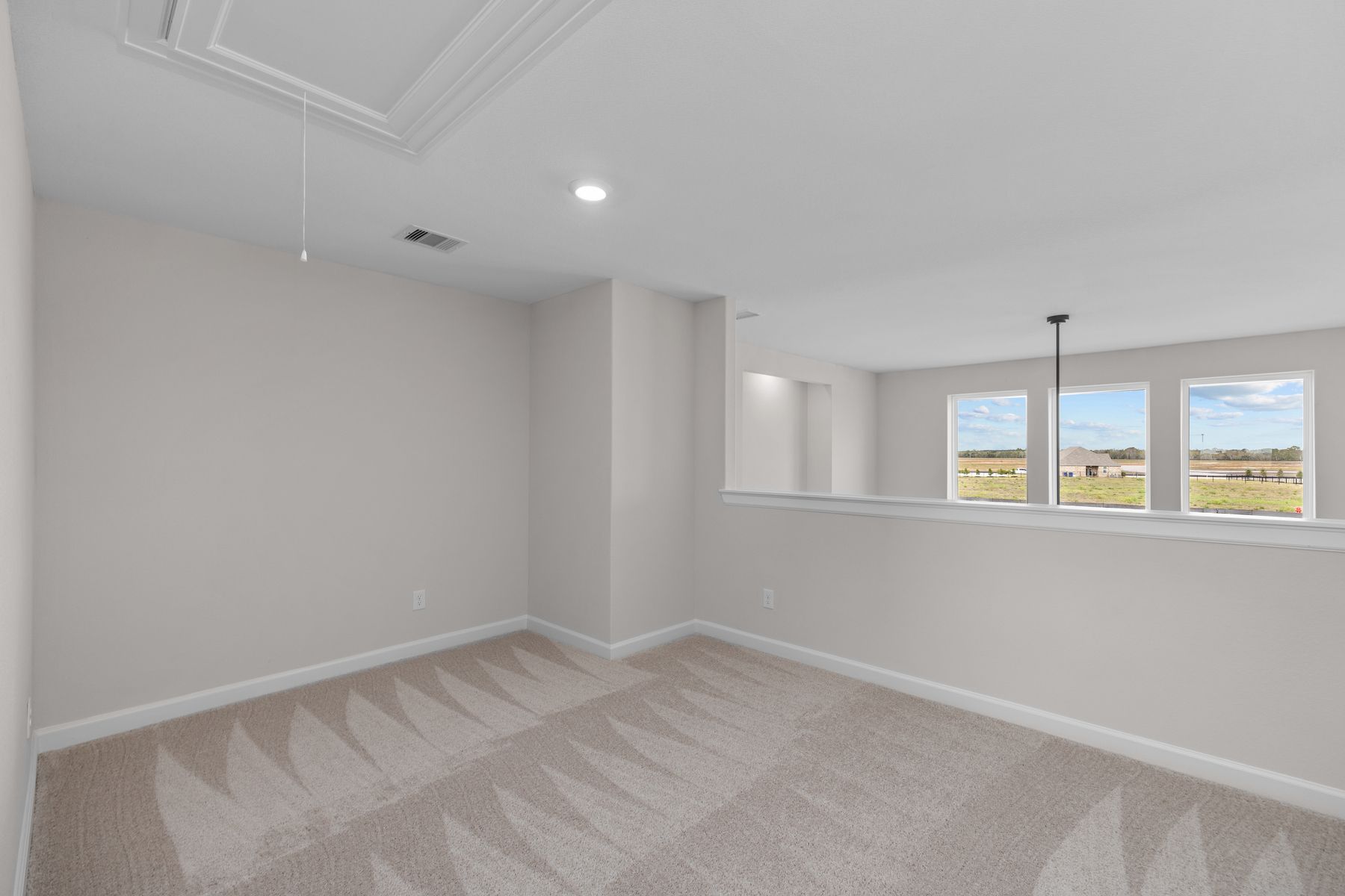 The upstairs game room is the best spot in the house for your kids to play.