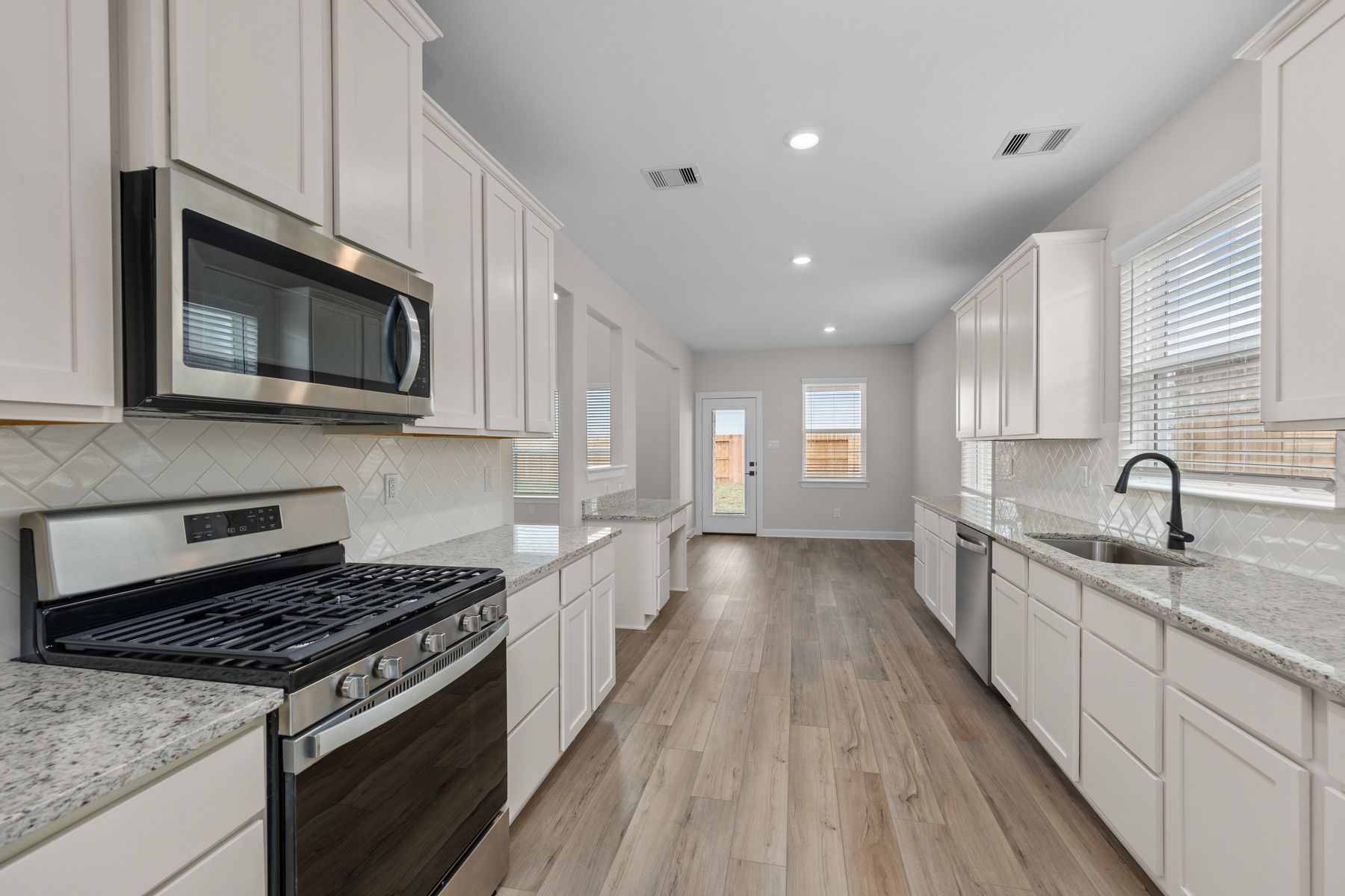 The kitchen is ready to host all your gatherings and potlucks.