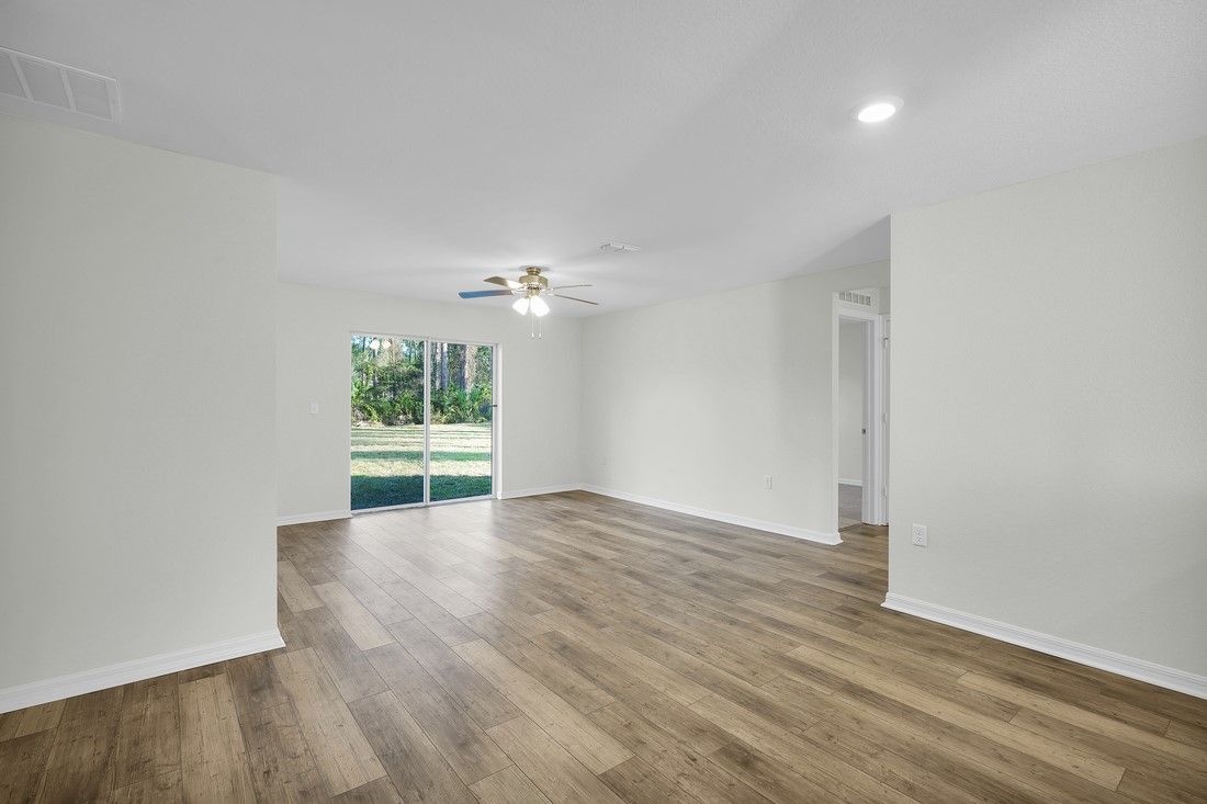 The family room is spacious and opens up easily to the dining room