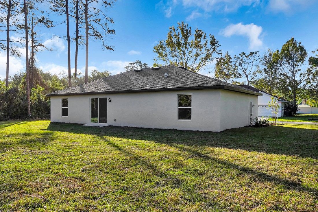 Enjoy a sliding glass door that opens the family room up to the backyard