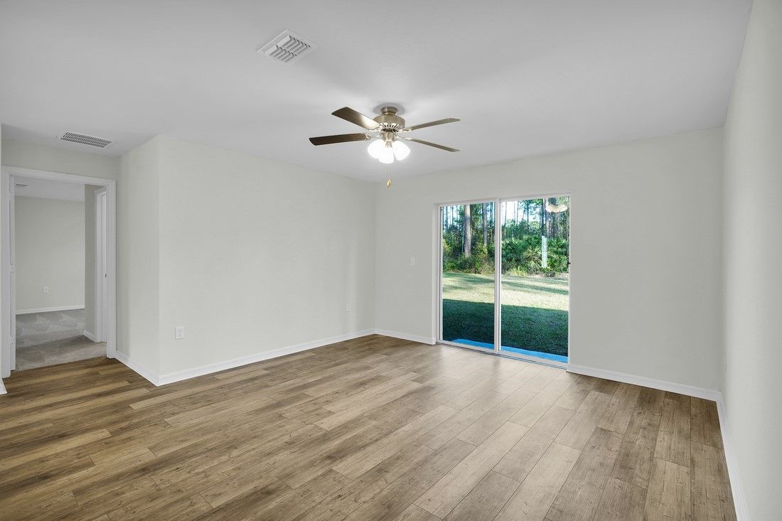 The family room's sliding doors makes it easy to enjoy the Florida weather