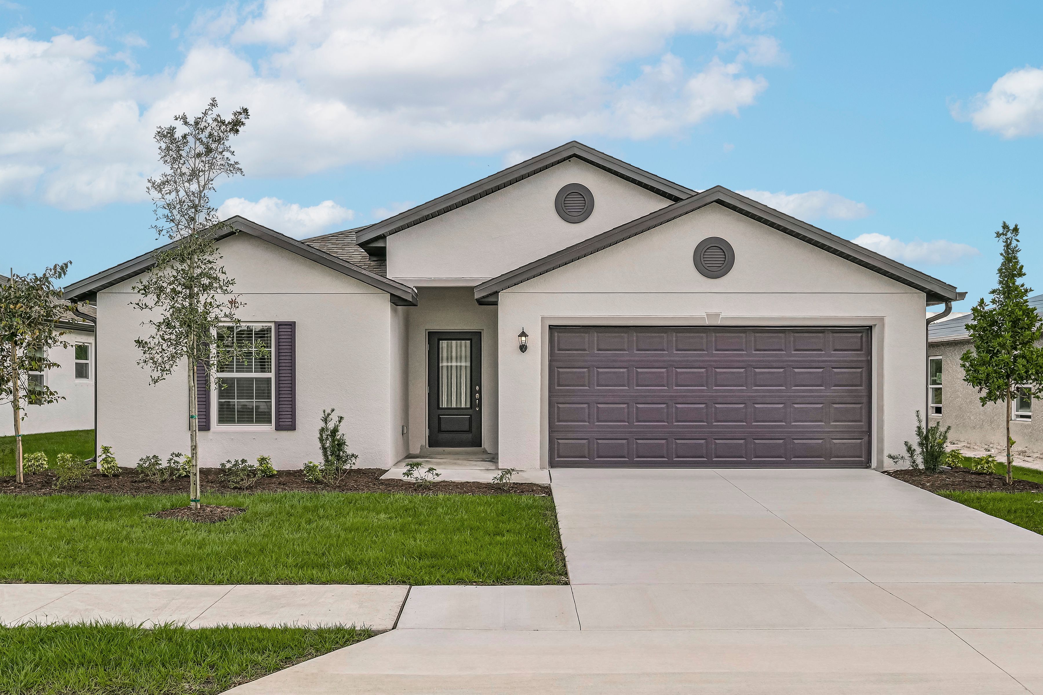 The Capri is a beautiful home with front yard landscaping 