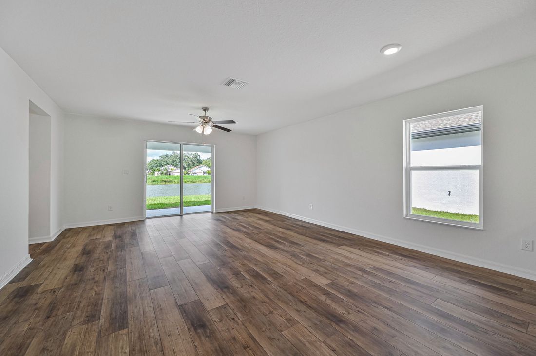 The family room has sliding glass doors that lead to the back patio