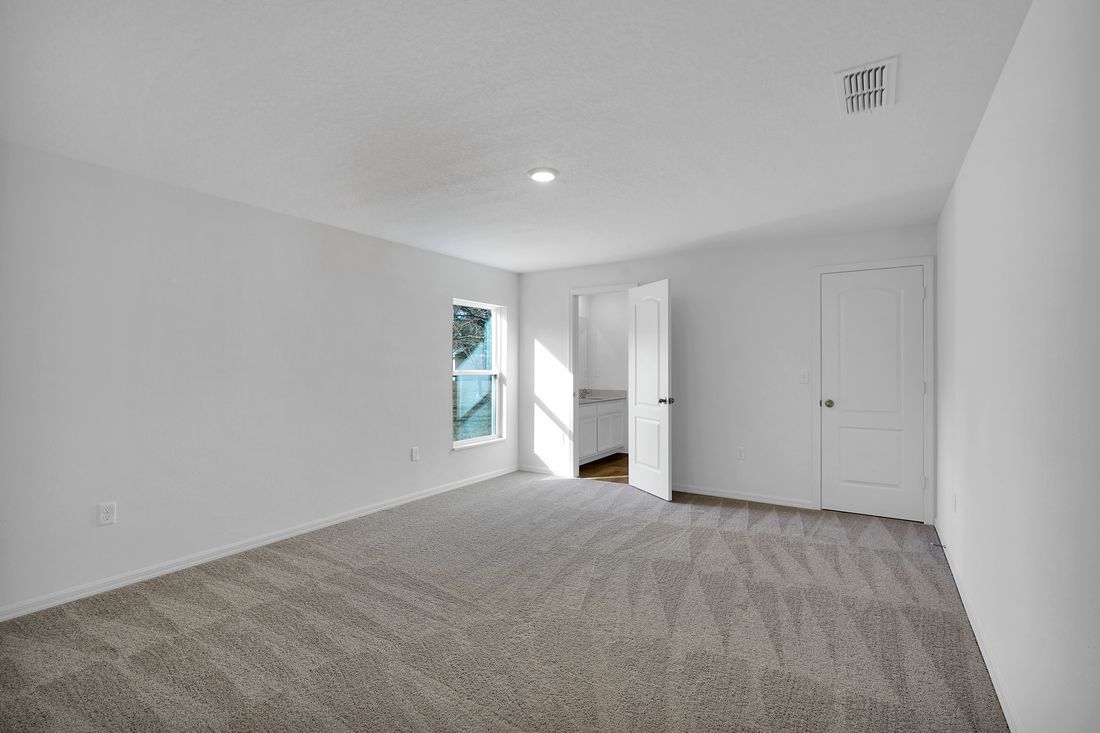 Massive master retreat features its own full bathroom