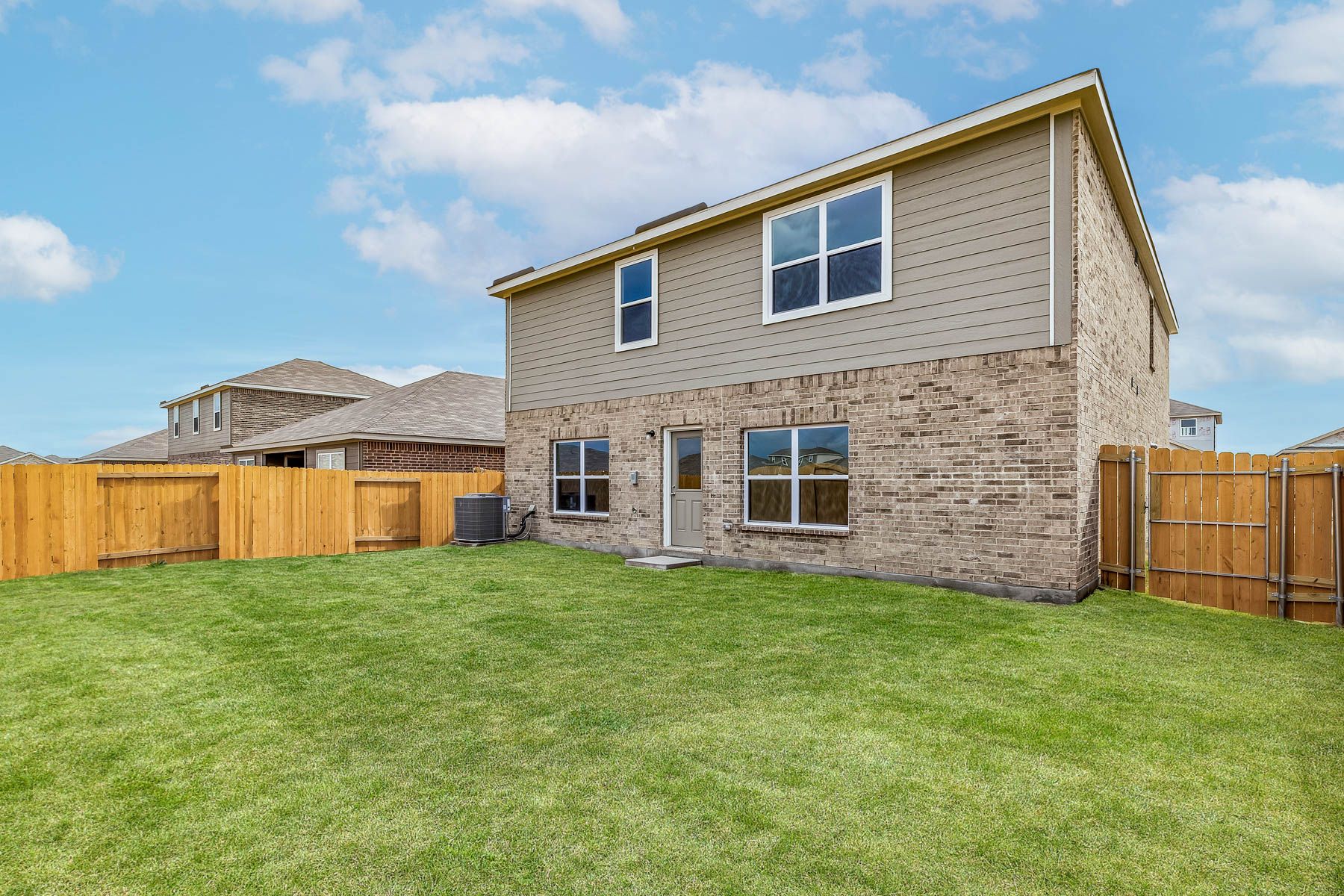 Fully, fenced-in backyard of the Driftwood in Patriot Estates