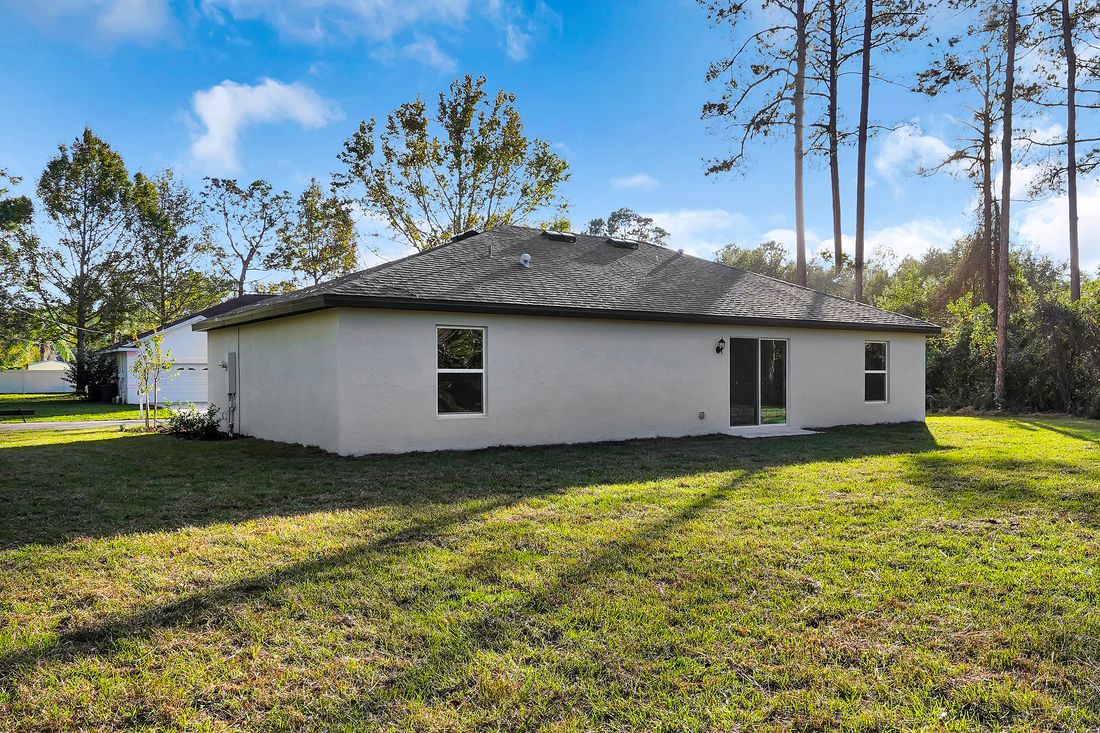 Enjoy a sliding glass door that opens the family room up to the backyard