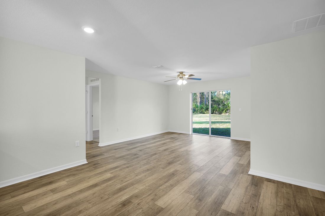 The family room is spacious and opens up easily to the dining room