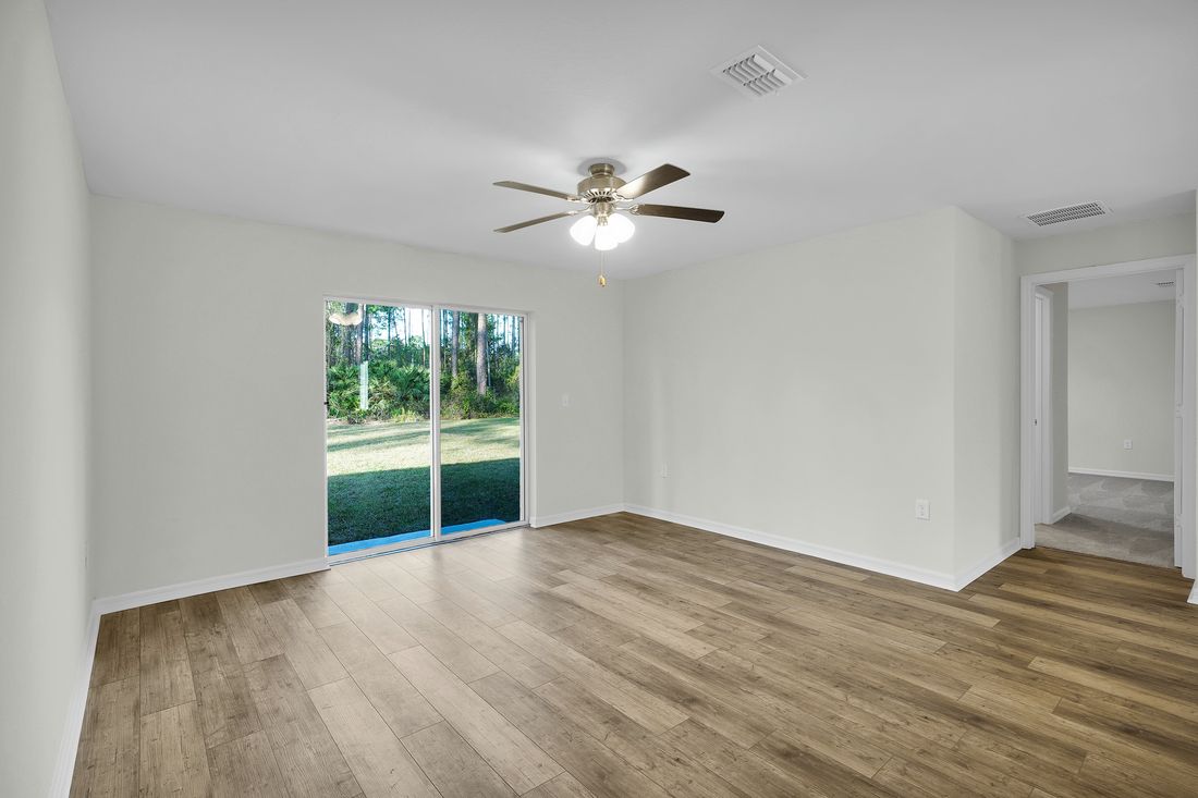 The family room's sliding doors makes it easy to enjoy the Florida weather