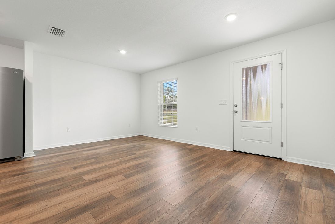 The dining room is just off of the kitchen, making it easy to host