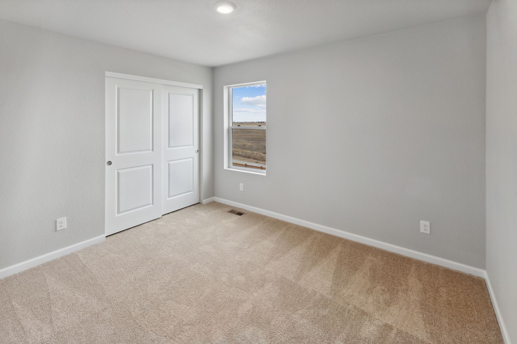 The third bedroom in the Yale floor plan is as a child's room or as an office space.