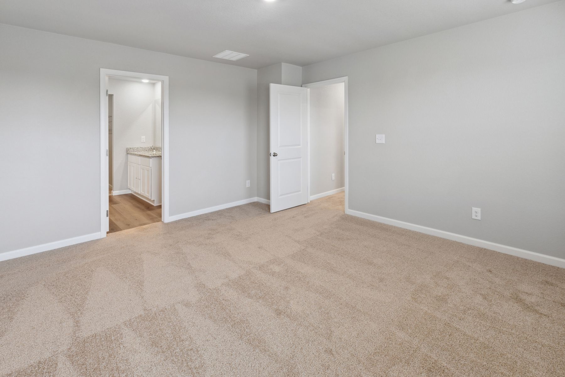 The master suite has a large bedroom, private bathroom and great, walk-in closet.