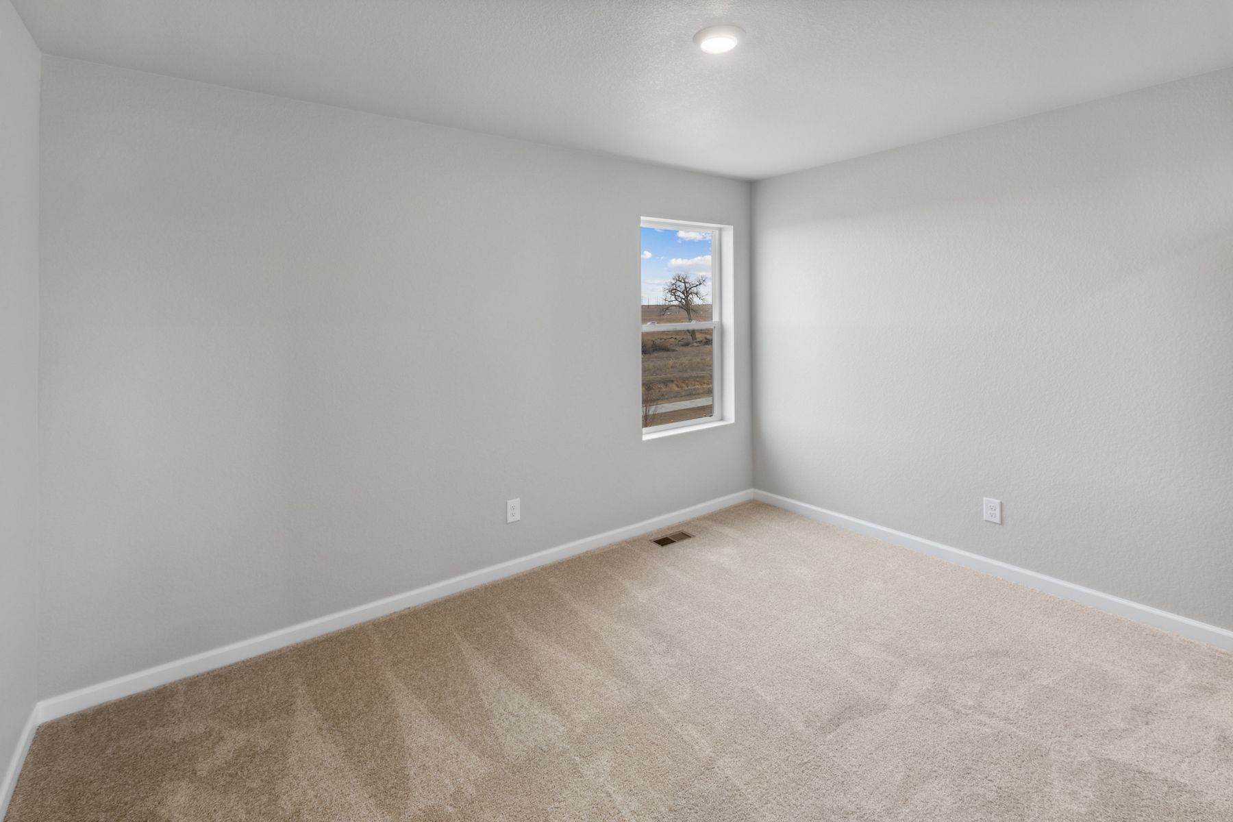 The second bedroom in the Yale floor plan is as a child's room or as a guest bedroom.