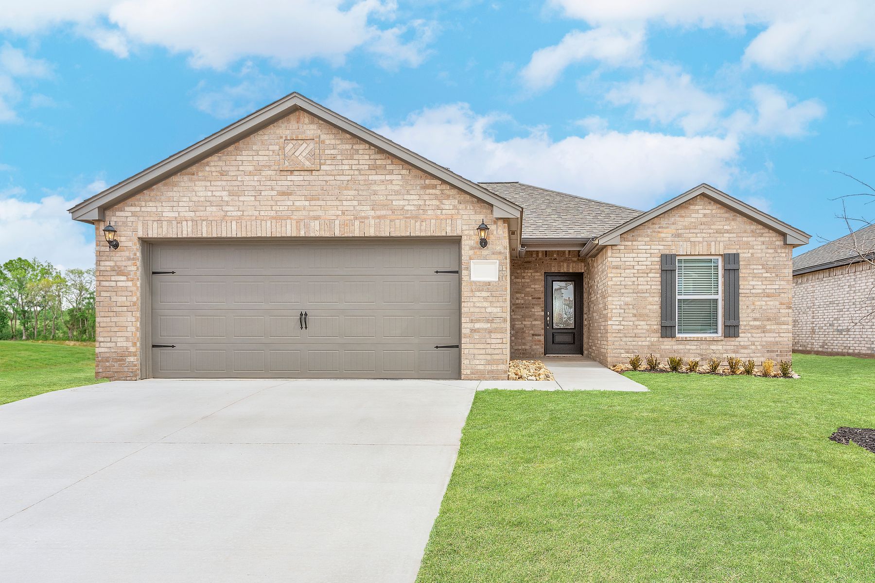 The beautiful, brick Arcadia plan at Crimson Lake Estates.