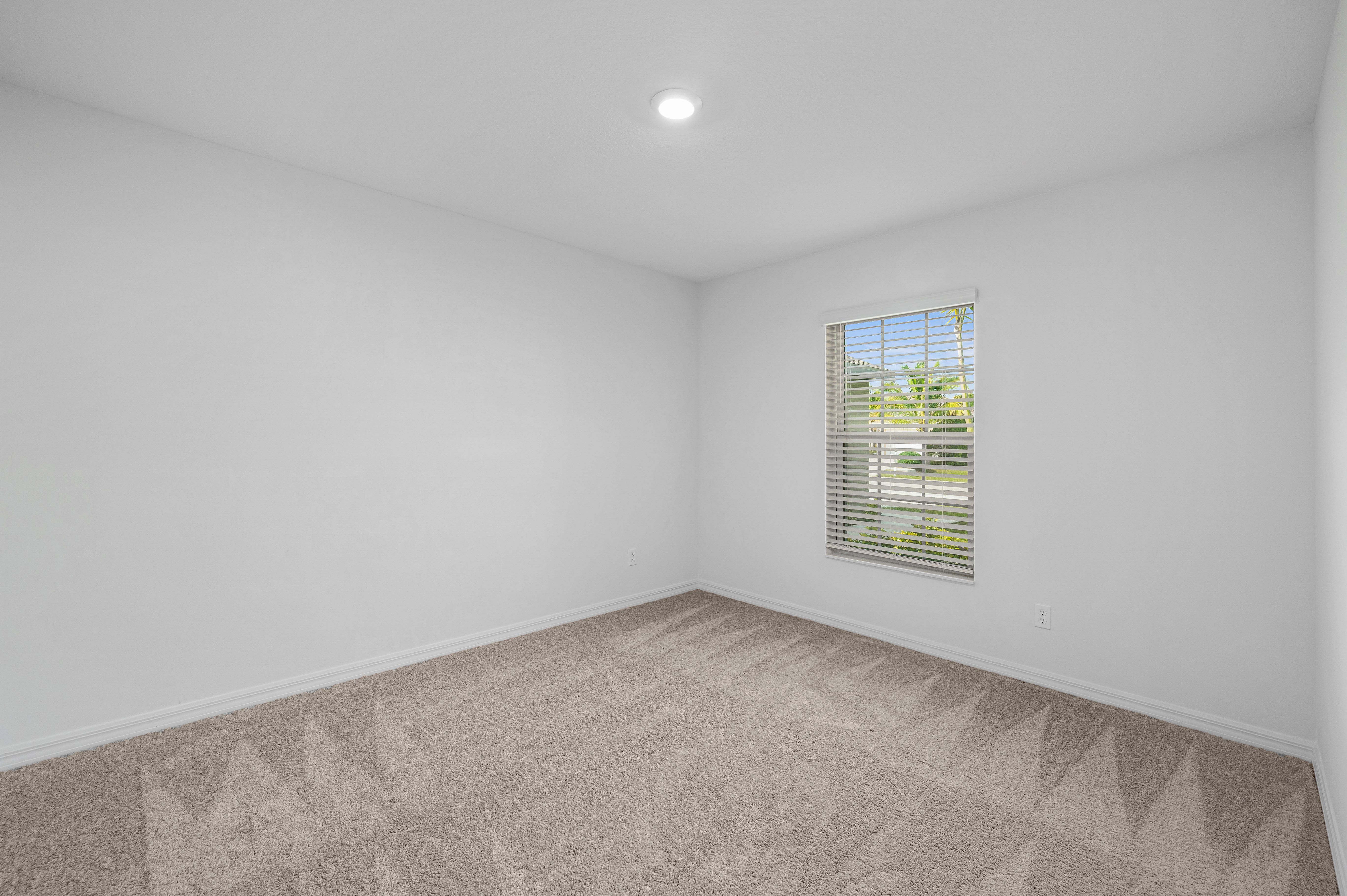 The guest bedrooms of the Braden are spacious with plenty of natural light