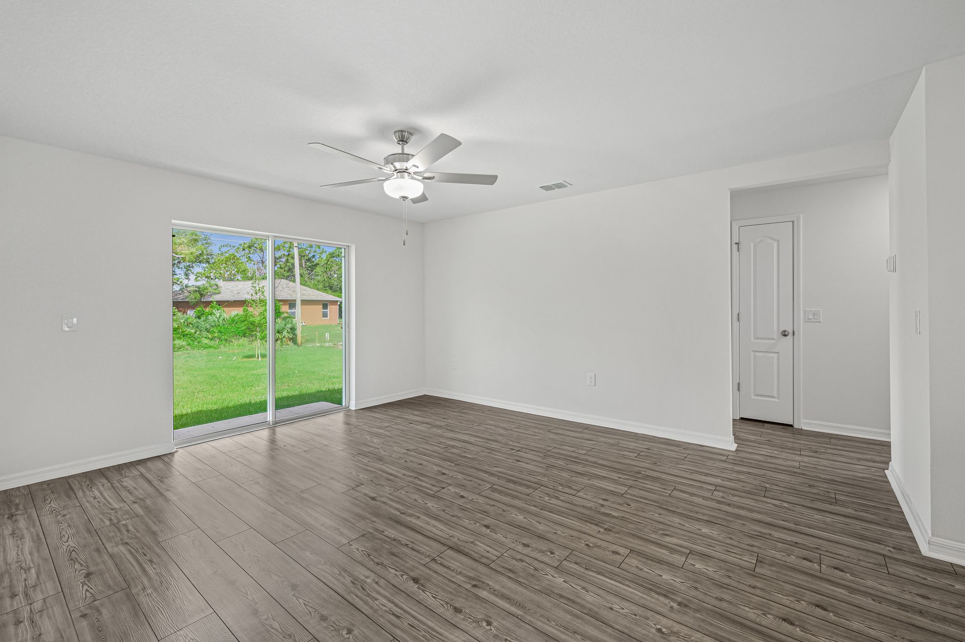 The family room is spacious and opens up easily to the dining room