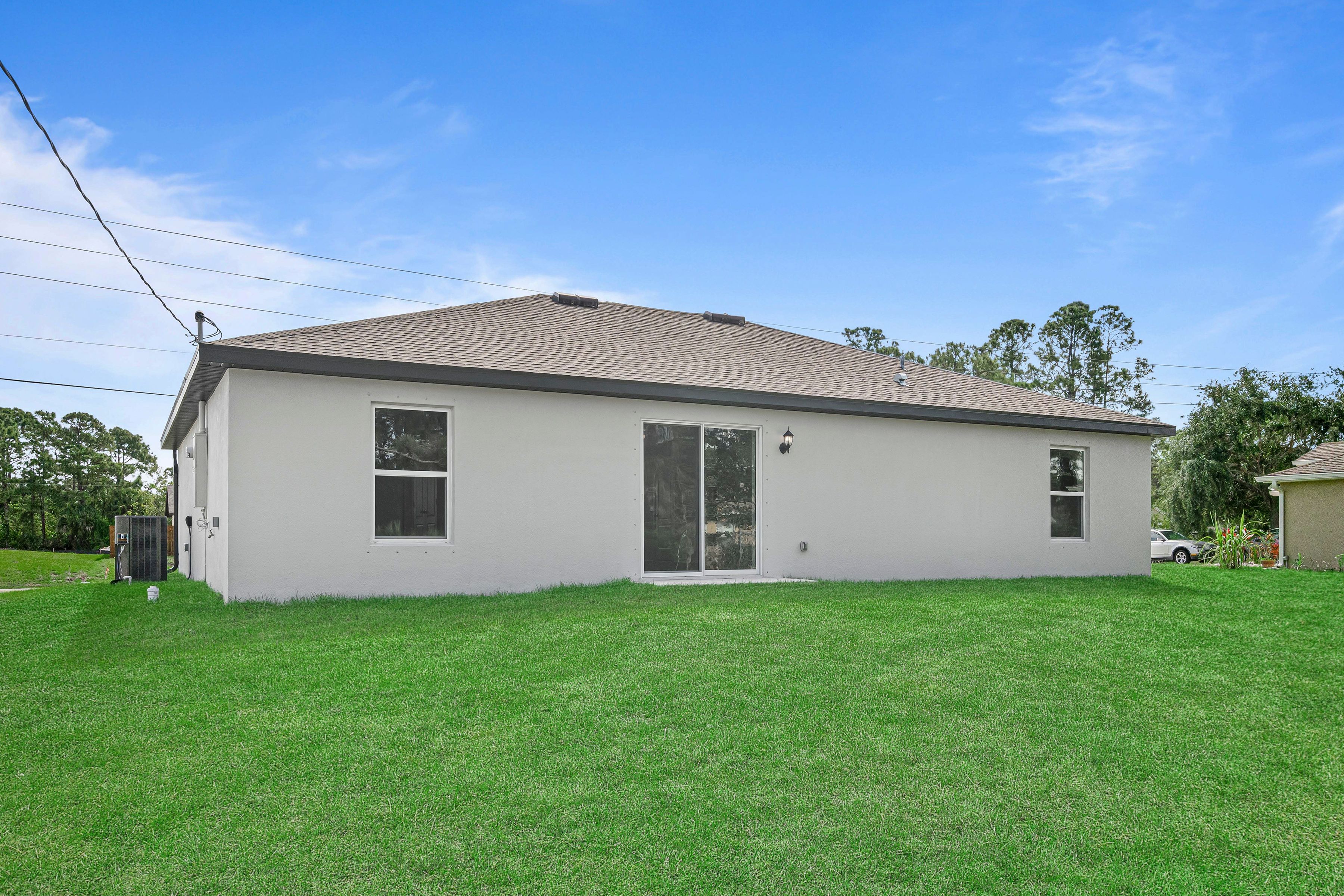 Enjoy a sliding glass door that opens the family room up to the backyard