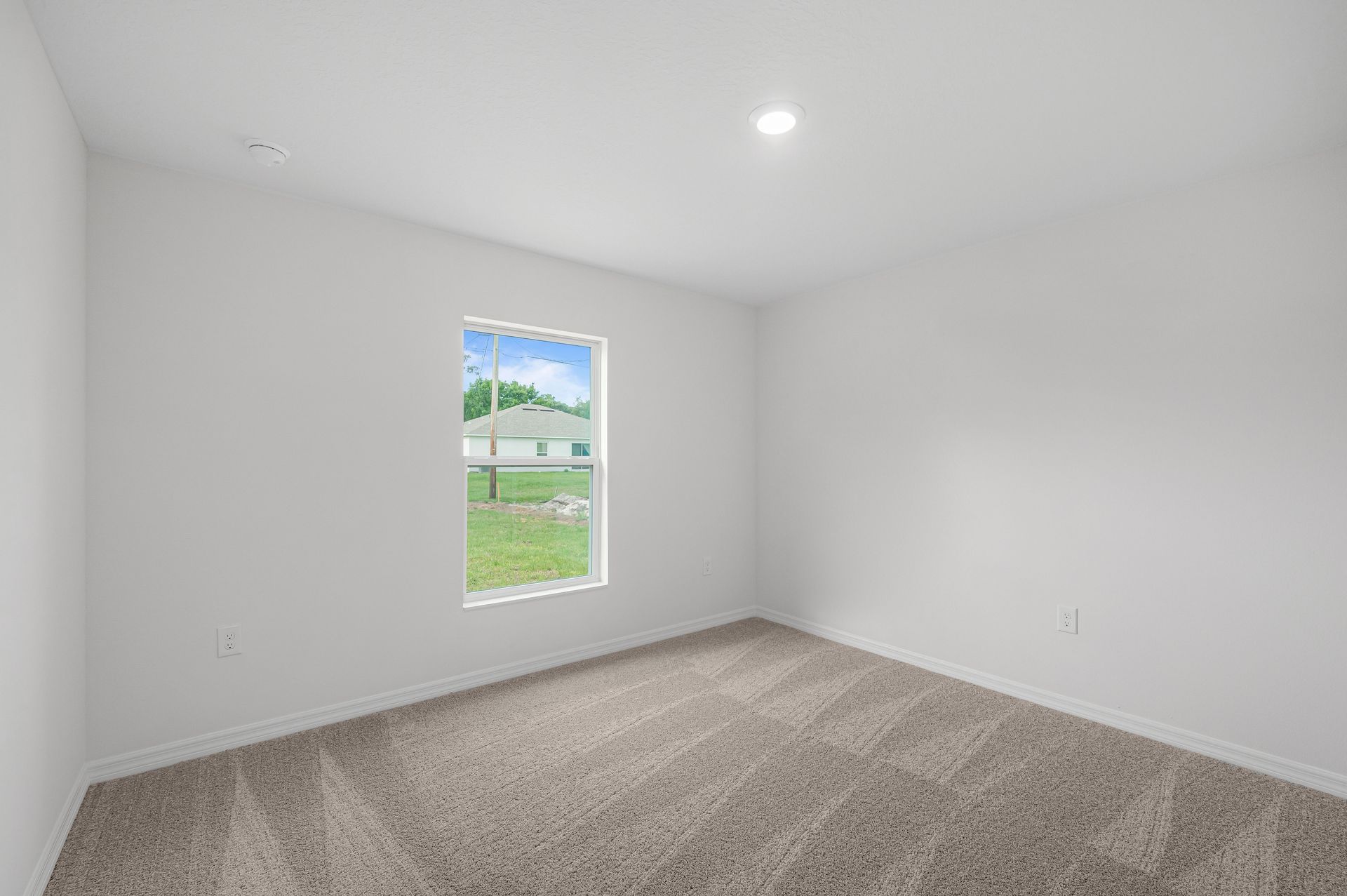 The spare bedrooms are also spacious and have natural lighting