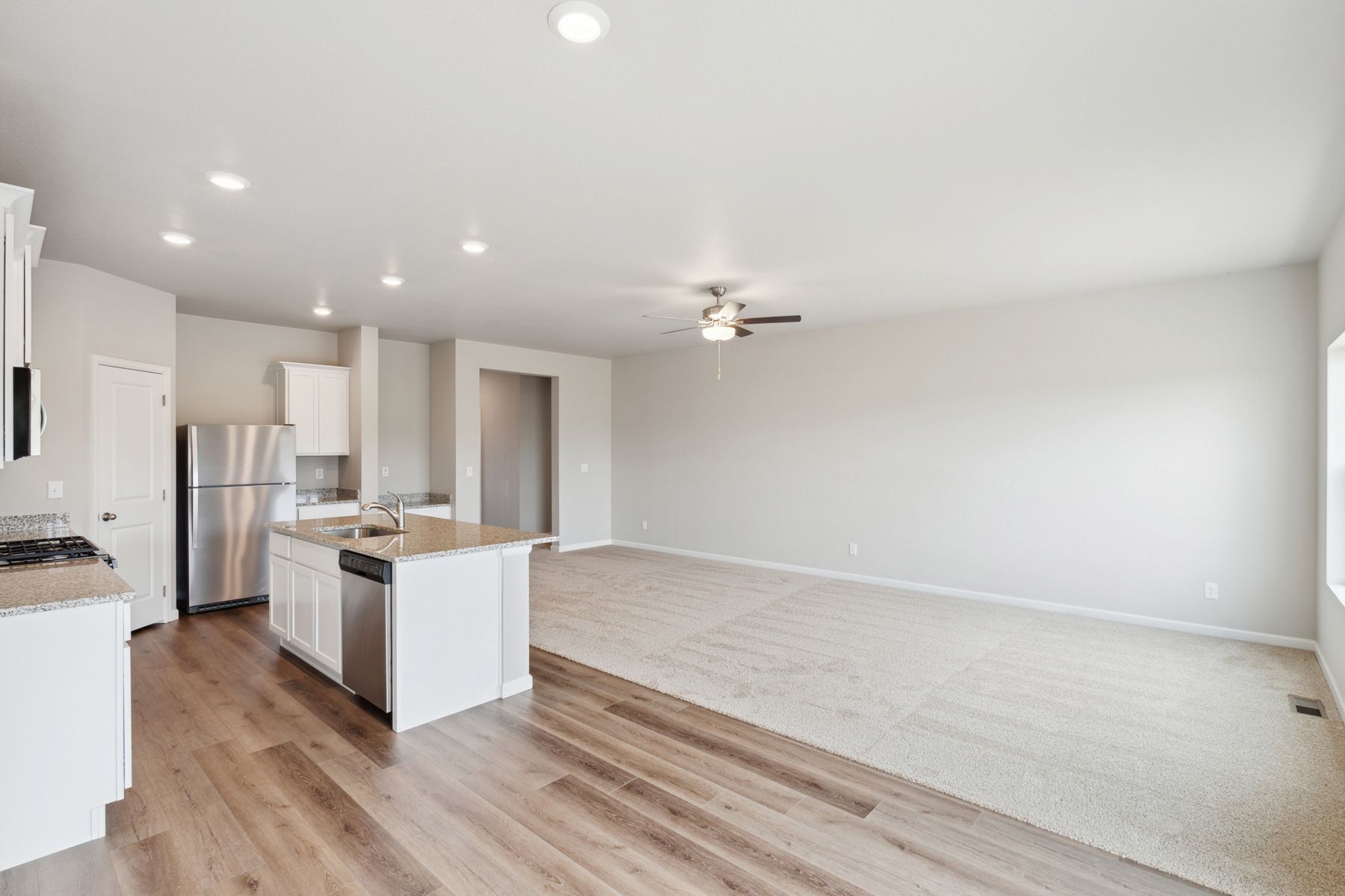 The Pike plan has an open-concept layout that is great for family living.