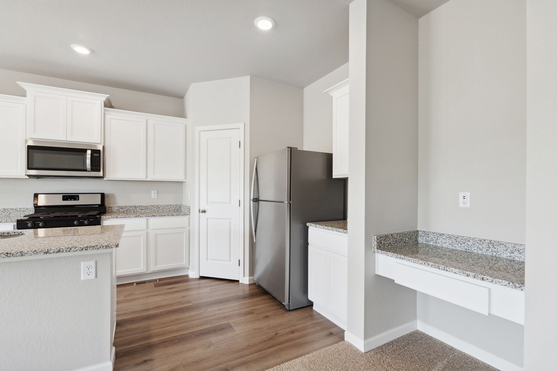 There is a wonderful desk space right off of the kitchen.