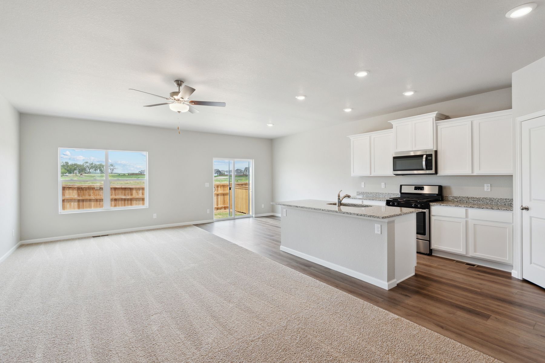 The kitchen in the Pike sits adjacent to the family room.