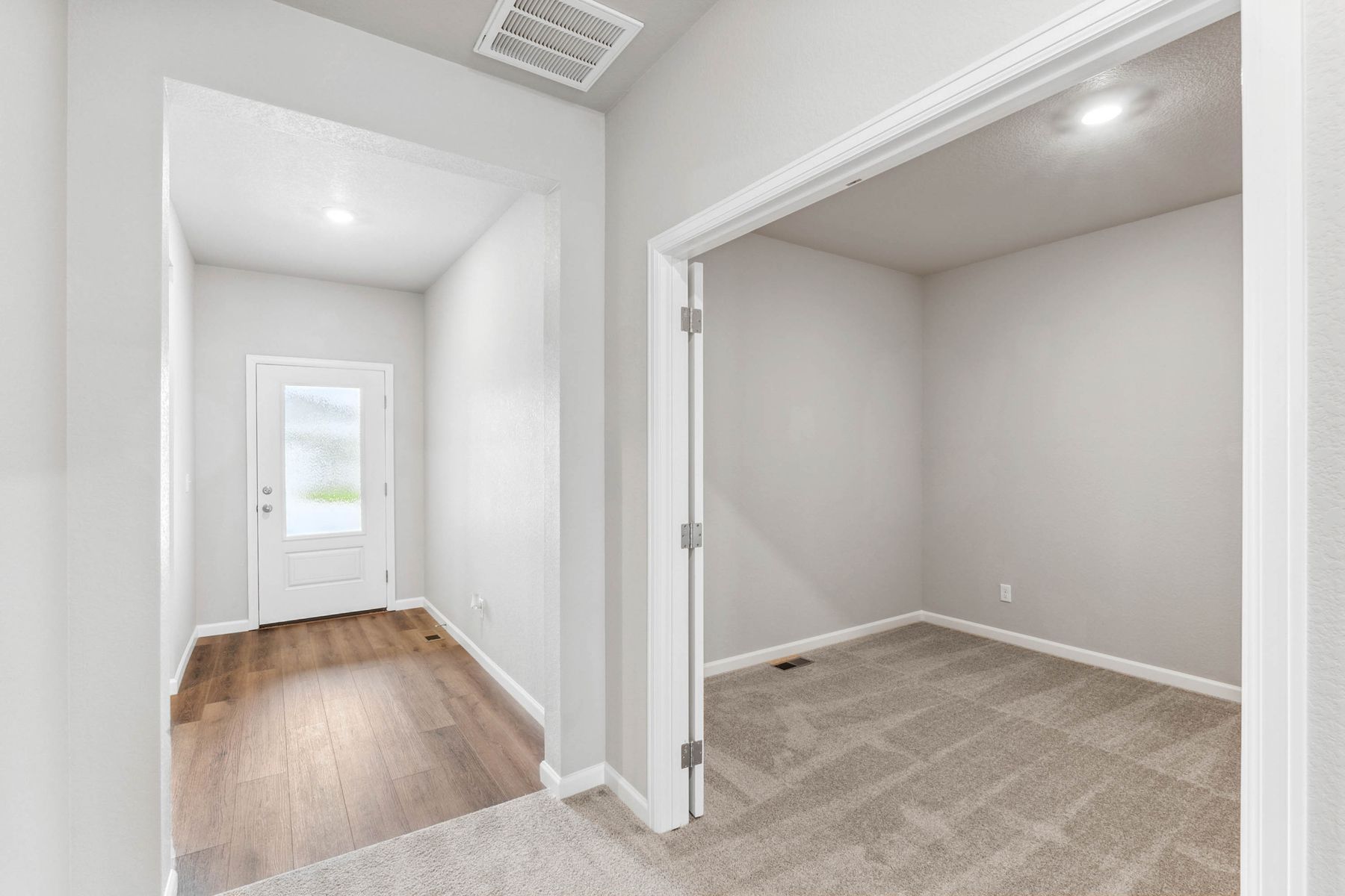 The Pike plan includes a flex room that sits right off of the foyer.
