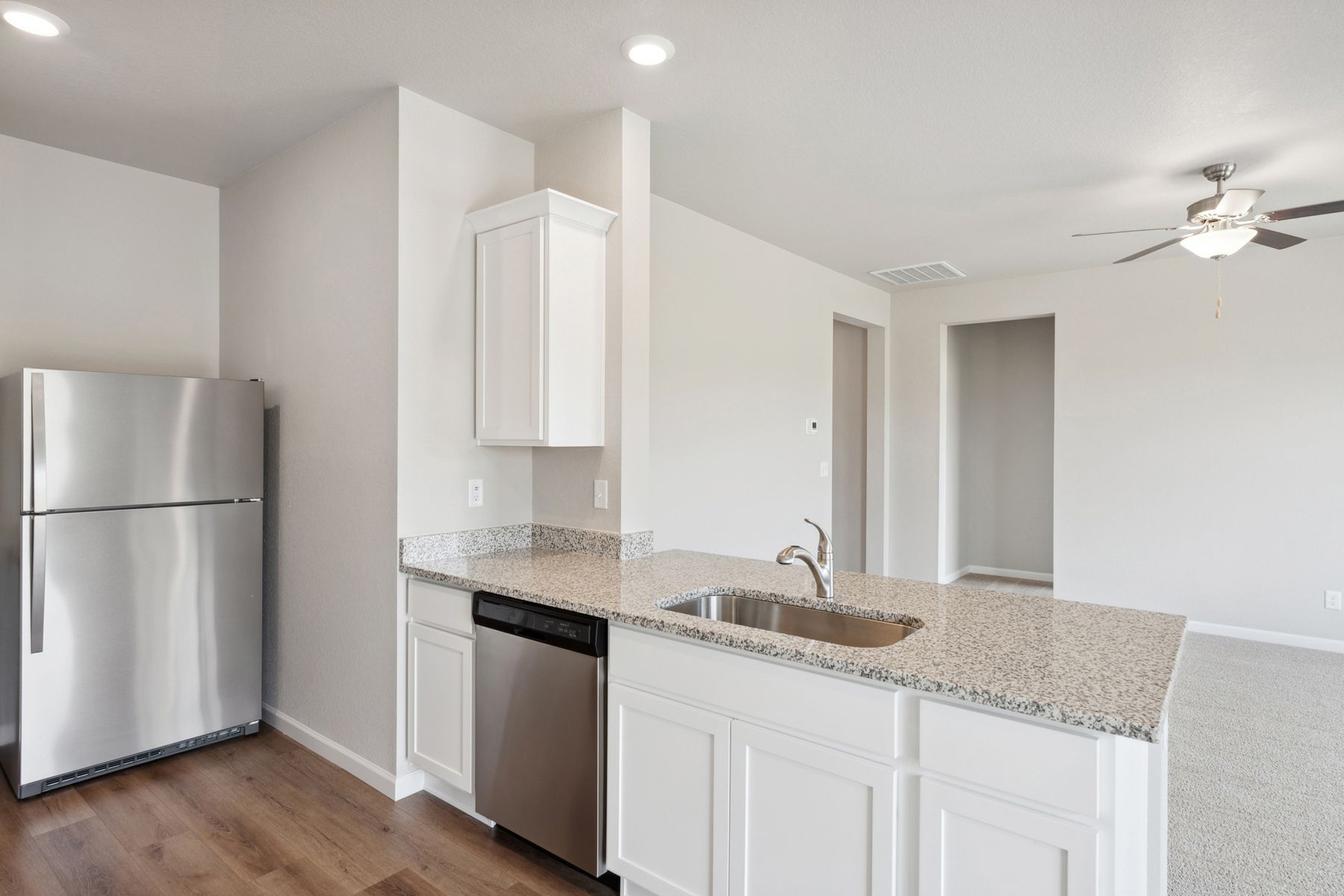 The family room of the Chatfield is located right off the kitchen.