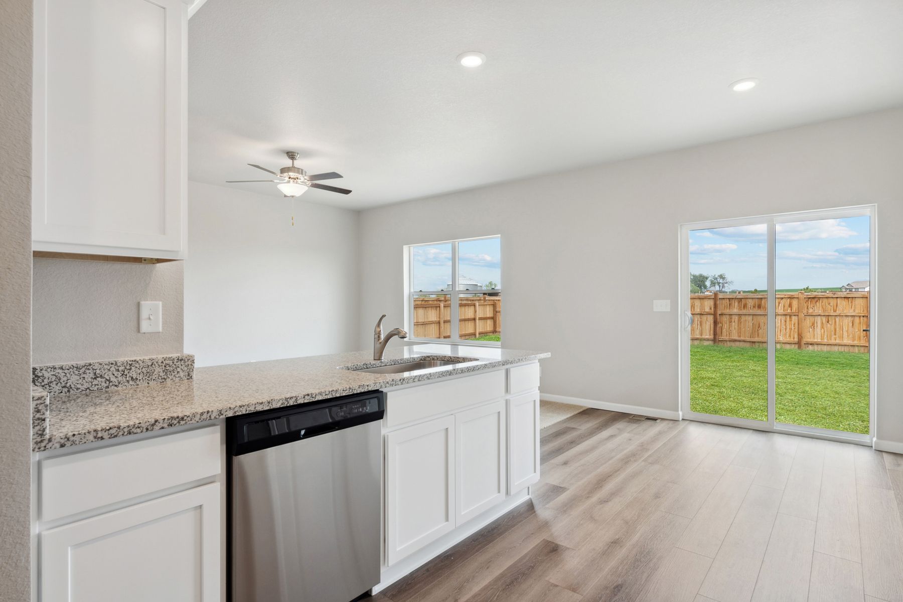 The dining space in the Chatfield is located next to the kitchen.