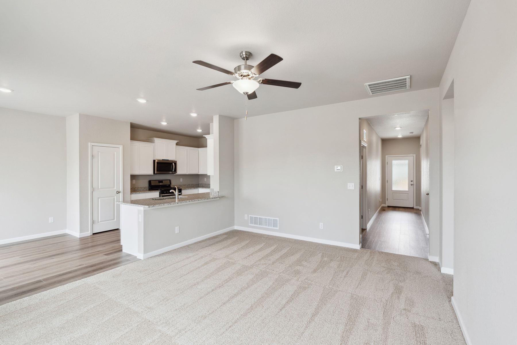 The foyer leads right into the family room.