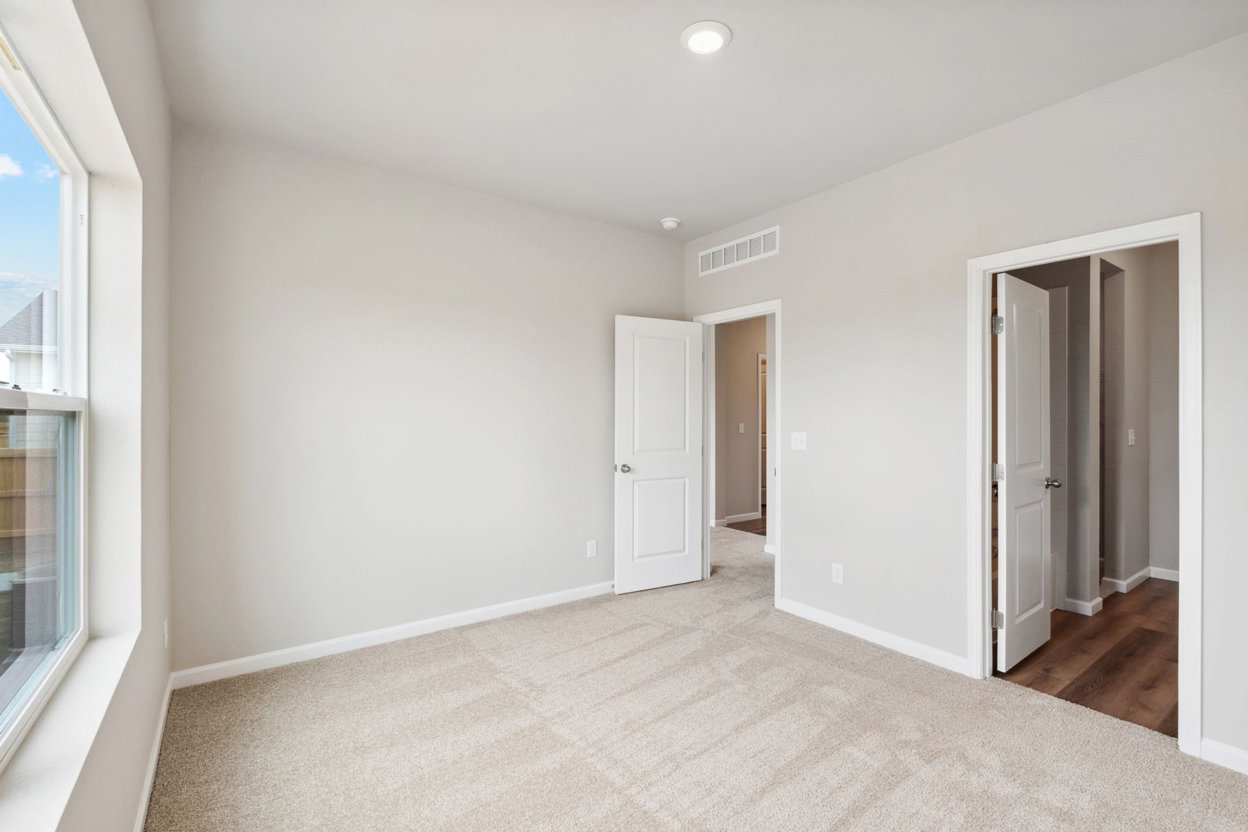 The master suite includes a bedroom, private bathroom, and walk-in closet.
