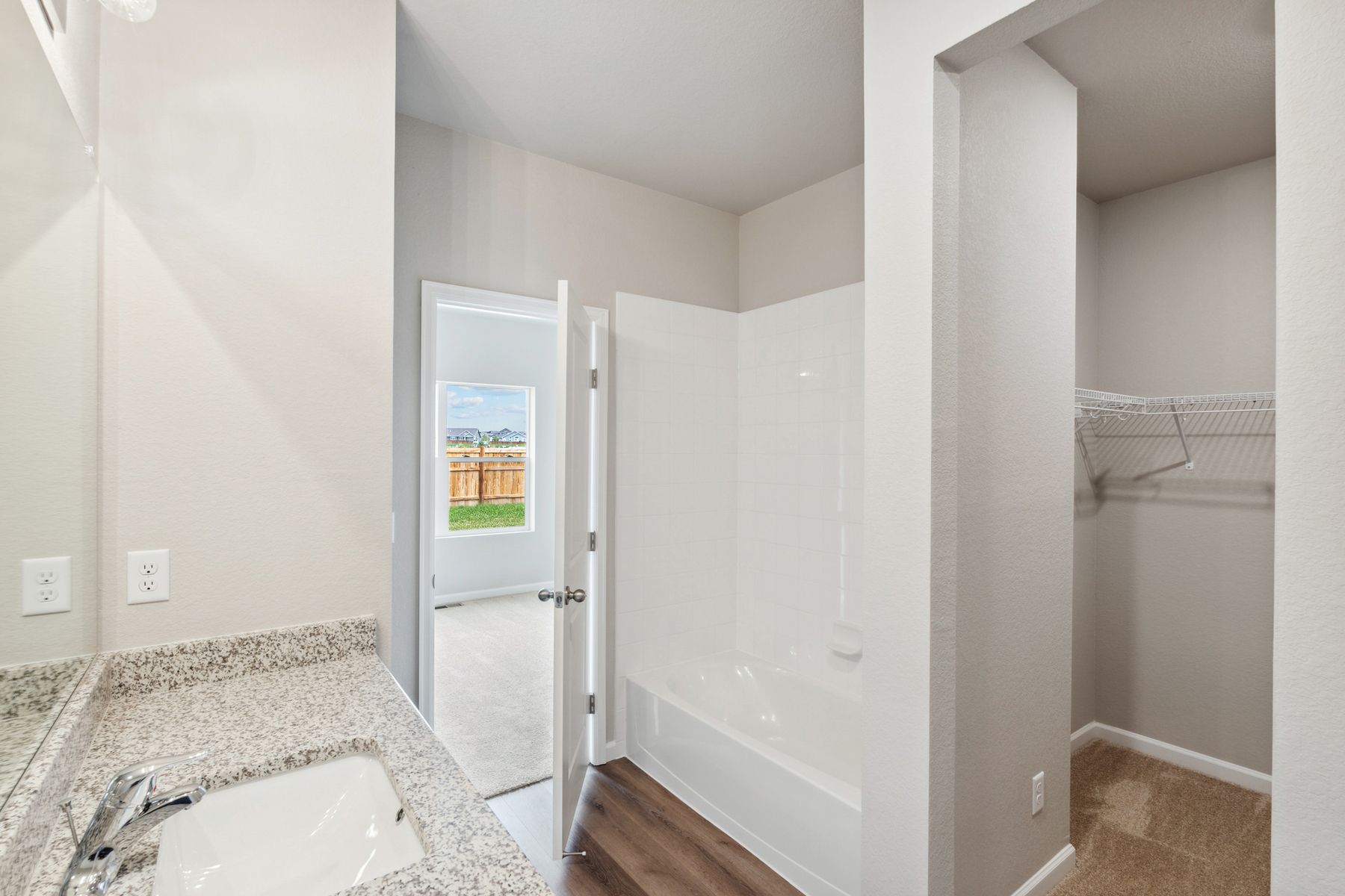 The master closet is located in the master bathroom.
