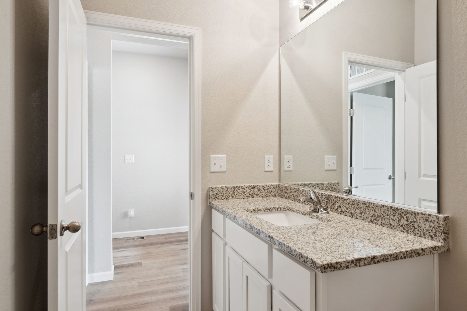 The secondary bathroom in the Chatfield has wonderful vanity space.