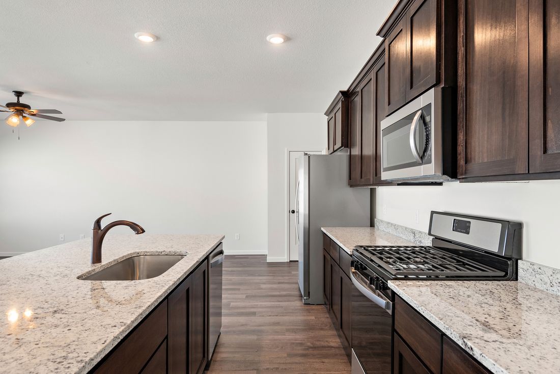 Granite counter tops, energy efficient appliances and Moen faucets all included.
