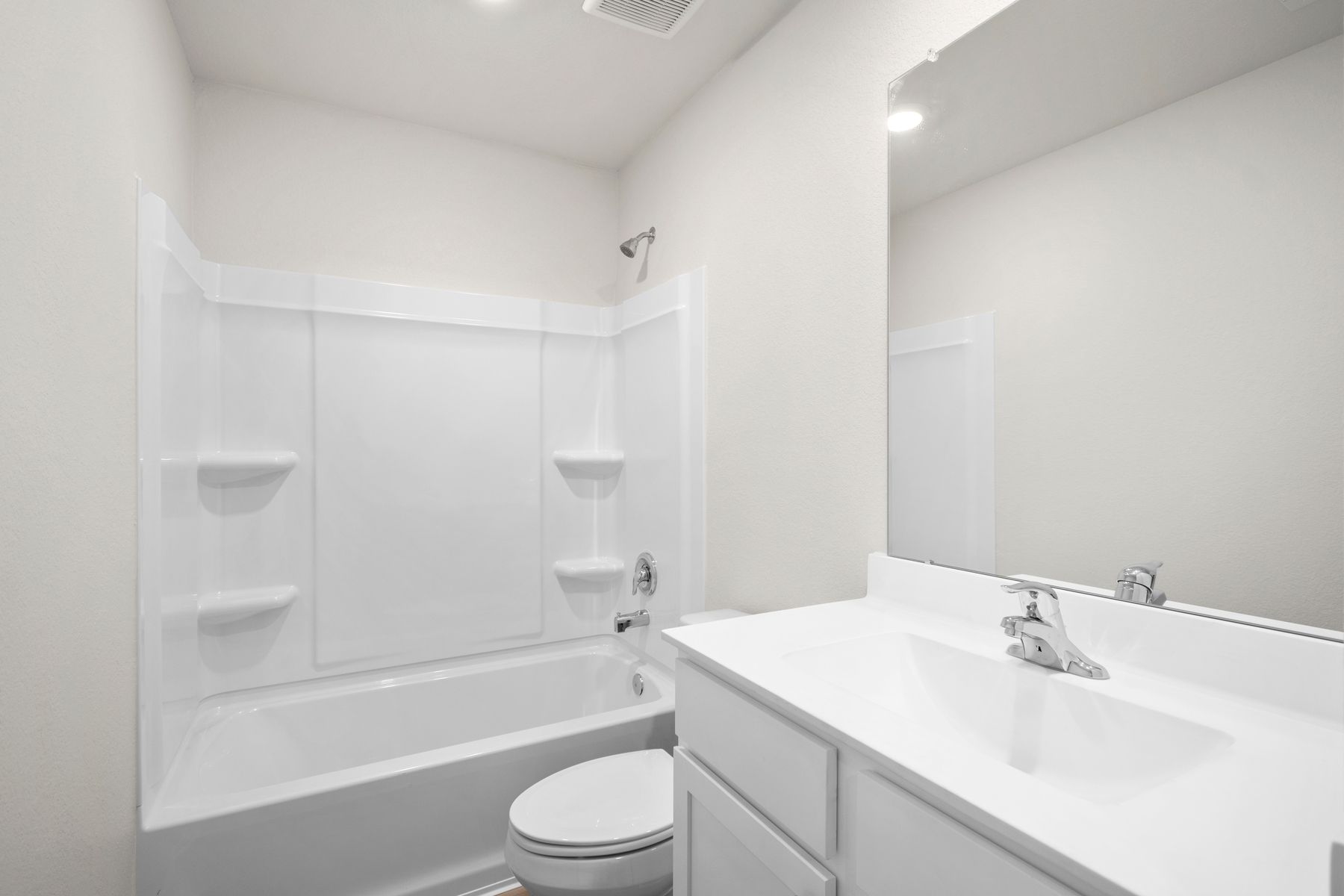 The secondary bathroom has a tub/shower combo.