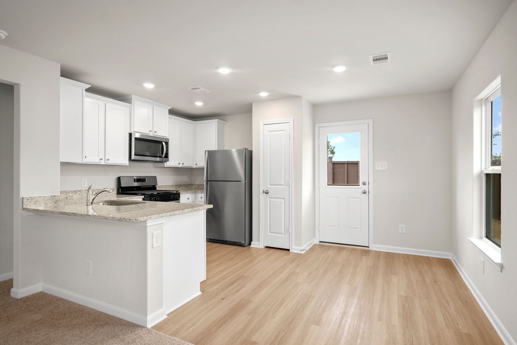 Your new kitchen includes a full suite of stainless steel appliances by Whirlpool.