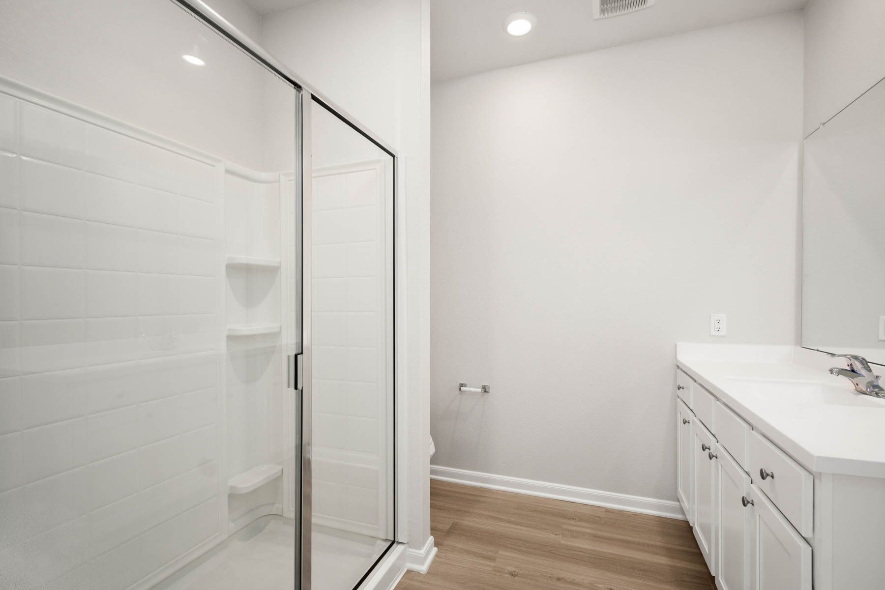 Pamper yourself in the master bathroom featuring a step in shower.