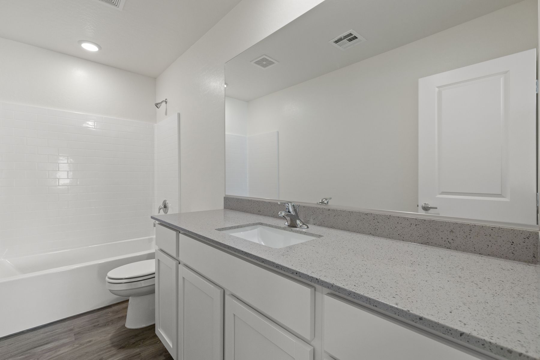 The secondary bathroom has a tub/shower combo!
